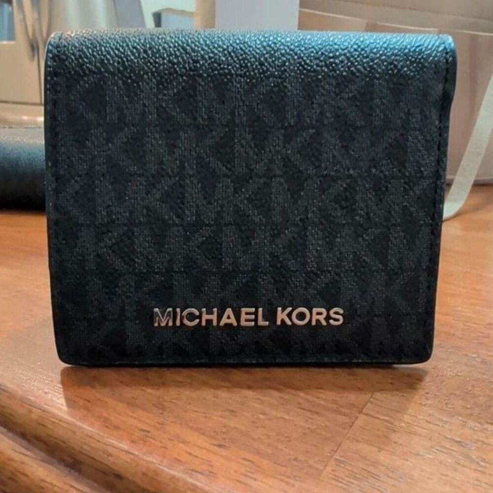 Mint condition Michael Kors Black Signature Trifold Wallet – Like New